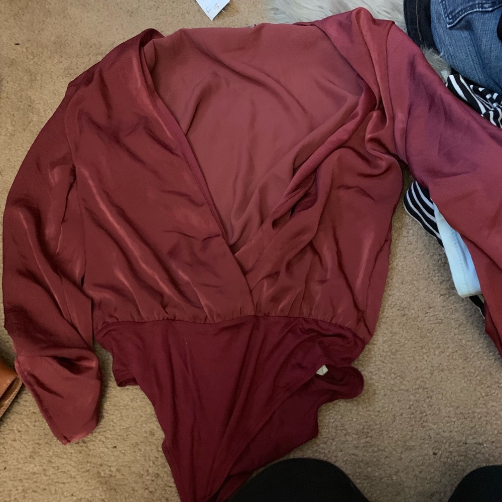 Fashion nova body suit .
